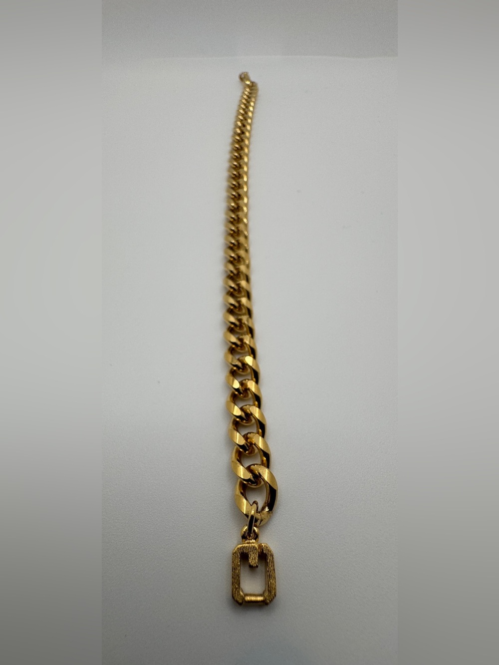 Givenchy Gold-Tone Curb Bracelet with Signature Link Clasp Size: 8.5 Unisex - Picture 9 of 14